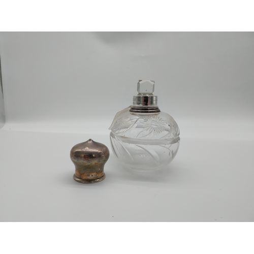 688 - 20th C. Cut glass perfume bottle with original glass stopper with English London silver hallmark 193... 