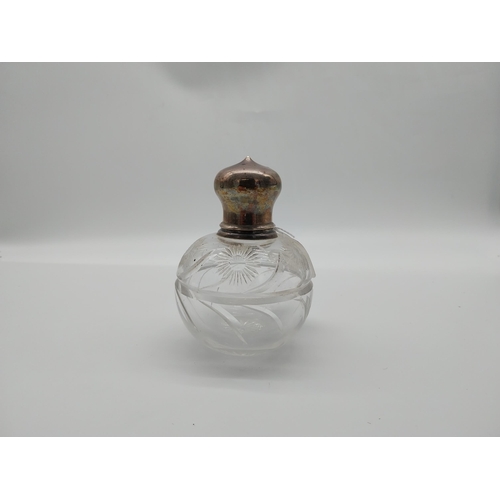 688 - 20th C. Cut glass perfume bottle with original glass stopper with English London silver hallmark 193... 