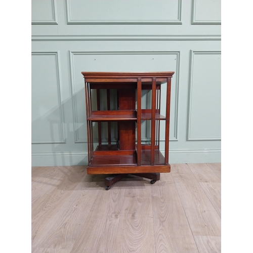 69 - Edwardian mahogany revolving bookcase. {83 cm H x 58 cm W x 58 cm W}.