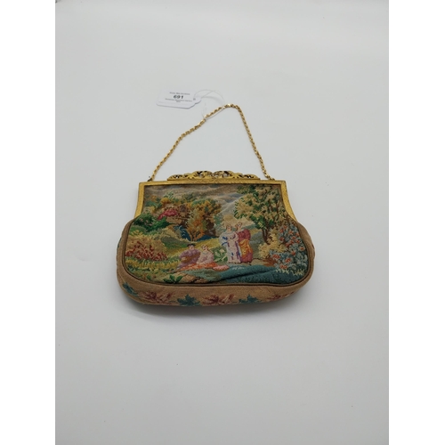 691 - J B and Co Vienna hand worked tapestry Ladies purse with gilt handle. {14 cm H x 15 cm W}.