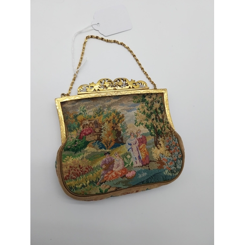 691 - J B and Co Vienna hand worked tapestry Ladies purse with gilt handle. {14 cm H x 15 cm W}.