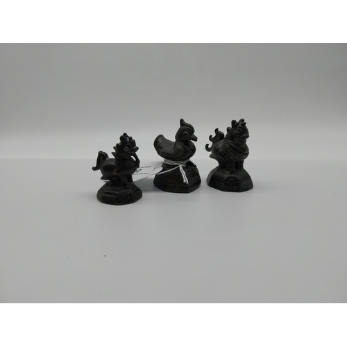 692 - Three 19th C. bronze netsukes � two Dogs of Fu and Duck. {5.5 cm H to 4.5 cm H}.