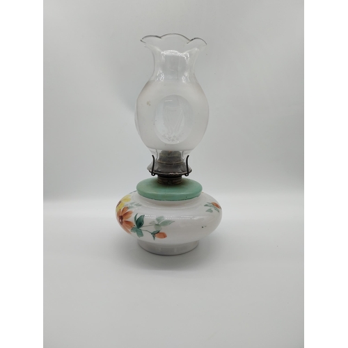 694 - 19th C. Home Rule lamp with milk glass bowl decorated with orange and yellow flowers with green foli... 