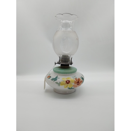 694 - 19th C. Home Rule lamp with milk glass bowl decorated with orange and yellow flowers with green foli... 