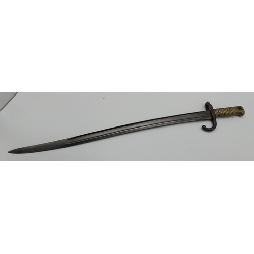 700 - WWI rifle bayonet and scabbard. {71 cm L}.