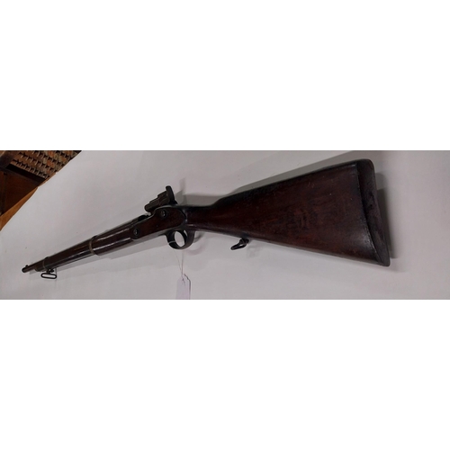 710A - 19th C. percussion capped rolling block rifle. {123 cm L x 13 cm H}.