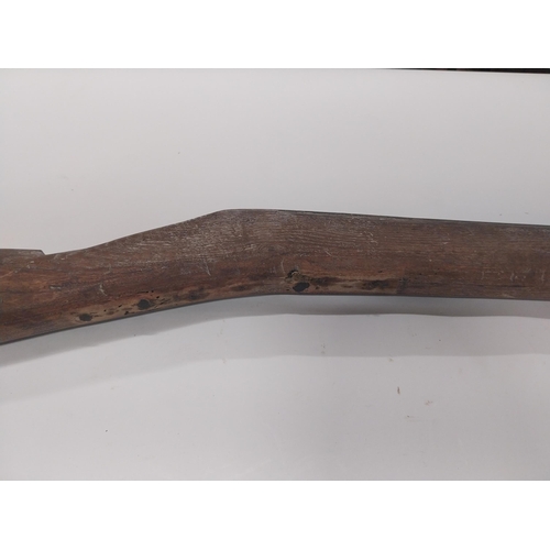 717A - 1912 UVF wooden training gun. {118 cm L x 12 cm H}.