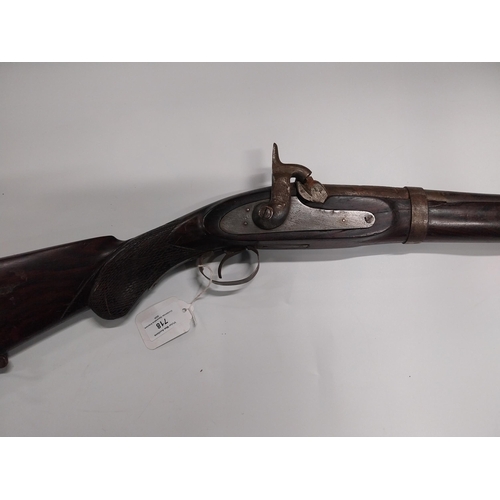 718 - 19th. C. Single barrelled percussion cap rifle with walnut stock. { 130cm L }.