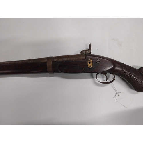 718 - 19th. C. Single barrelled percussion cap rifle with walnut stock. { 130cm L }.