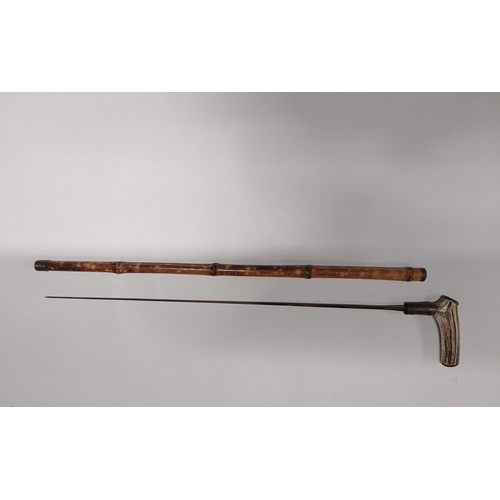 728 - 19th C. Sword stick with bamboo and horn handle. {87 cm L}.