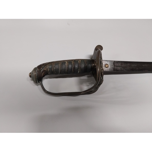 730 - V R Officer�s sword with floral decoration on blade with basket hilt in scabbard.