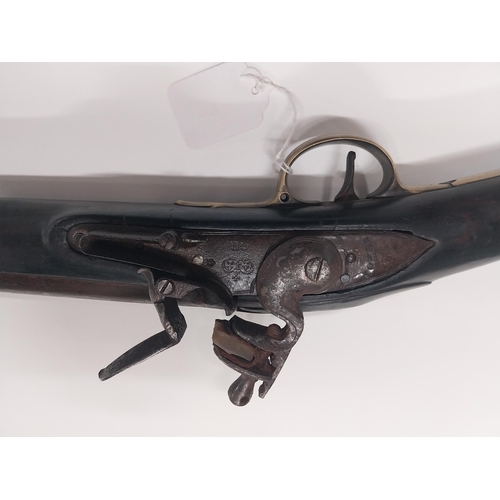 731 - 19th C. Brown Bess Tower Gun GR flintlock rifle with original ramrod. {134 cm H x 13 cm W}.