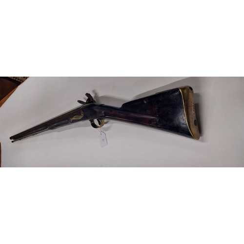 731 - 19th C. Brown Bess Tower Gun GR flintlock rifle with original ramrod. {134 cm H x 13 cm W}.