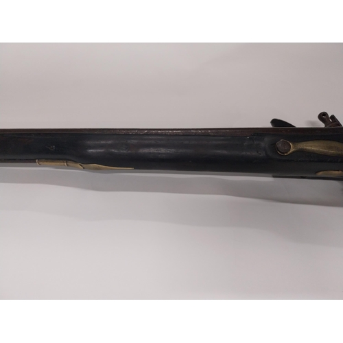 731 - 19th C. Brown Bess Tower Gun GR flintlock rifle with original ramrod. {134 cm H x 13 cm W}.