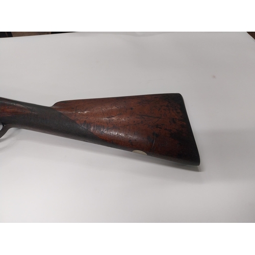 735 - Rare 19th C. fowling percussion capped gun with original ramrod. {160 cm L x 13 cm W}.