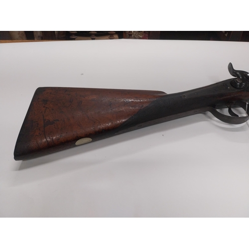 735 - Rare 19th C. fowling percussion capped gun with original ramrod. {160 cm L x 13 cm W}.