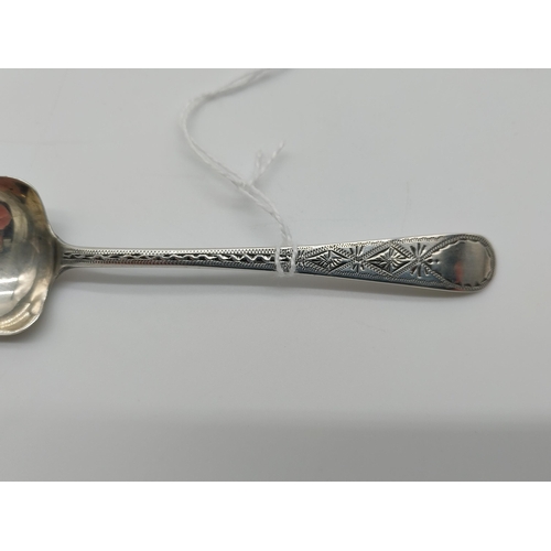 742 - English silver bright cut caddy spoon. Hallmarked in London. 1818 - 19. Maker: I H possibly James Hi... 