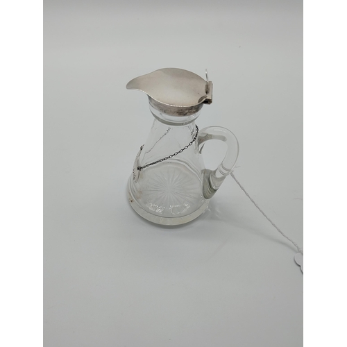 747 - English silver mounted Whisky toddy jug, with label on chain. Hallmarked in Birmingham 1910. Maker: ... 