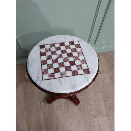 75 - Mahogany and rosewood games table with marble top in the William IV style.  {77 cm H x 58 cm Dia.}