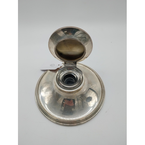 752 - English silver inkwell with packed base and glass well. Hallmarked in Birmingham 1928. Makers marks ... 