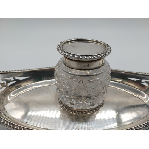 755 - Cut glass scent bottle with English silver cap and matching tray. Hallmarked in Birmingham 1904. Mak... 