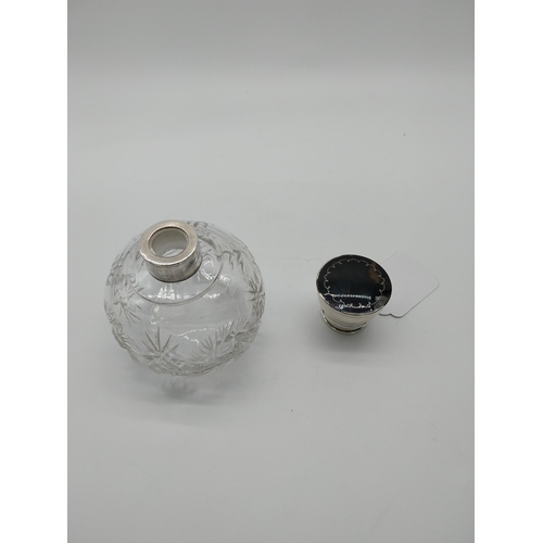 756 - Cut glass scent bottle with English silver and tortoise shell cap. Hallmarks rubbed.  {10 cm H x 8 c... 