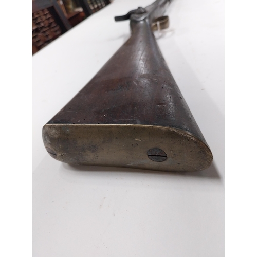 762 - 19th C. percussion capped military long barrelled rifle. {149 cm L}.