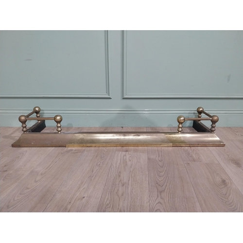 765 - Edwardian brass adjustable fire fender. {18 cm H x 132 cm W x 36 cm W}.