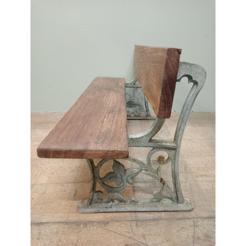 824 - Rare Victorian cast iron and wooden child's bench. {  }.  NOT AVAILABLE TO VIEW IN PERSON.