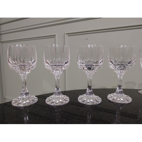 88 - Seven cut glass wine glasses. {15 cm H}