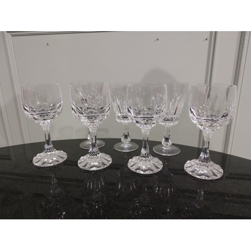 88 - Seven cut glass wine glasses. {15 cm H}