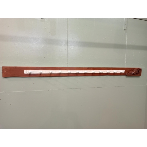 89 - Coat and hat rack on board {H 12cm x W 204cm x D 4cm}. NOT AVAILABLE TO VIEW IN PERSON.