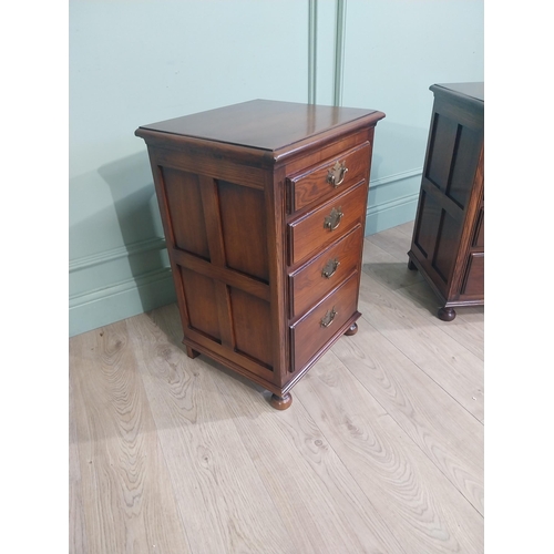 91 - Pair of good quality oak bedside lockers with four graduated short drawers on bun feet. {70 cm H x 4... 