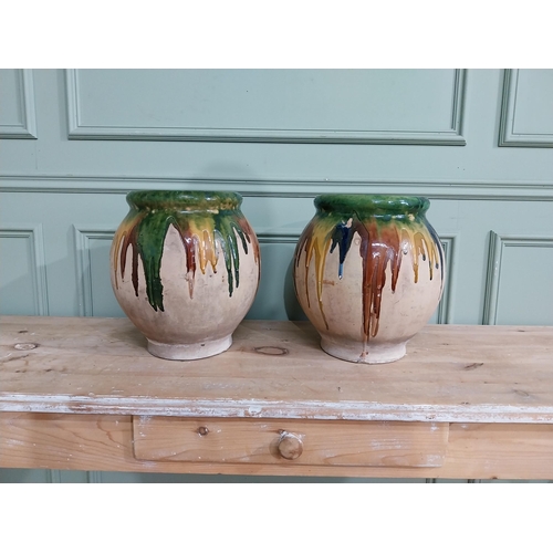 92 - Pair of early 20th C. French drip glazed terracotta urns. {35 cm H x 24 cm Dia.}