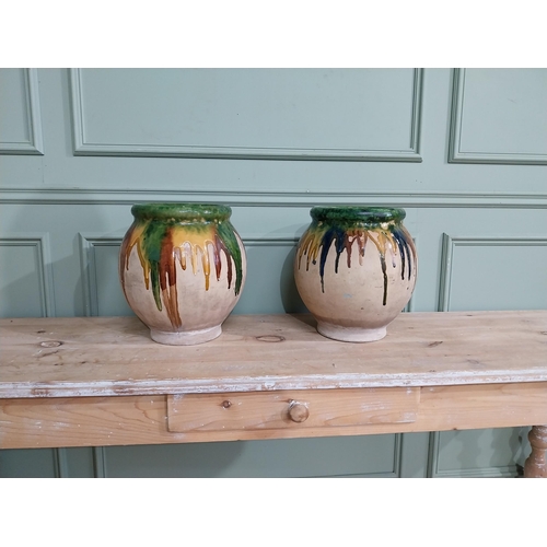 92 - Pair of early 20th C. French drip glazed terracotta urns. {35 cm H x 24 cm Dia.}