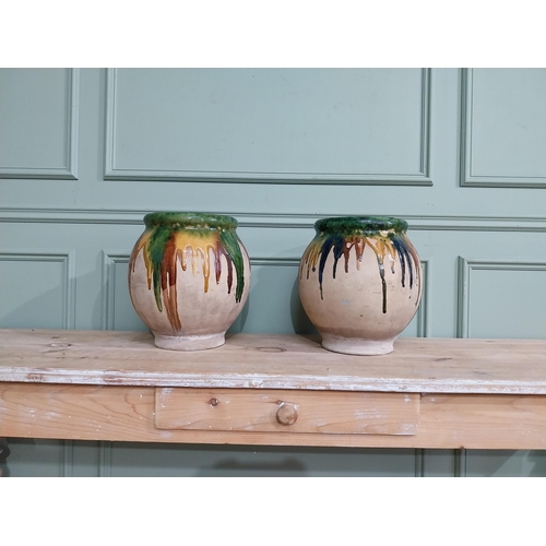 92 - Pair of early 20th C. French drip glazed terracotta urns. {35 cm H x 24 cm Dia.}