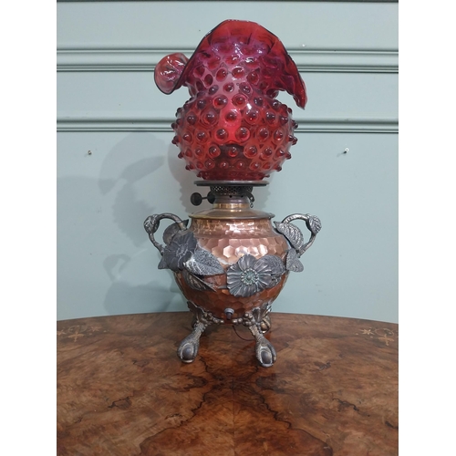 95 - Good quality copper and silver plate oil lamp with ruby glass shade. {45 cm H x 23 cm Dia.}.