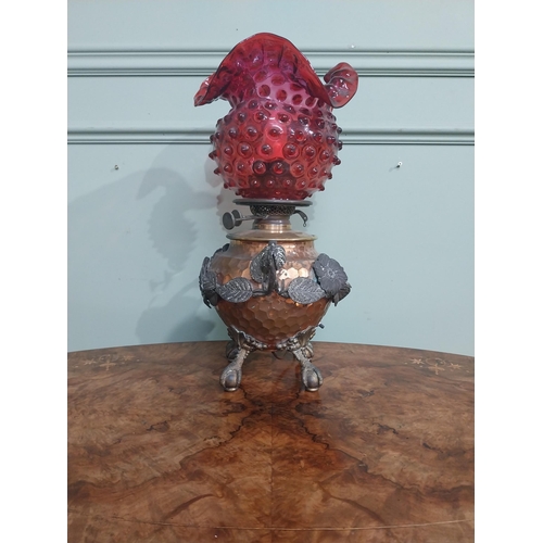 95 - Good quality copper and silver plate oil lamp with ruby glass shade. {45 cm H x 23 cm Dia.}.