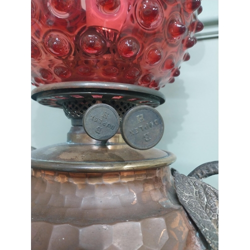 95 - Good quality copper and silver plate oil lamp with ruby glass shade. {45 cm H x 23 cm Dia.}.