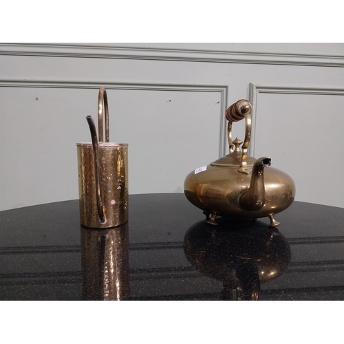 96 - Two Edwardian brass kettles. {20 cm H x 26 cm W x 18 cm } and {24 cm H x 22 cm W x 18 cm D}.