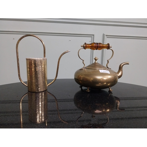 96 - Two Edwardian brass kettles. {20 cm H x 26 cm W x 18 cm } and {24 cm H x 22 cm W x 18 cm D}.