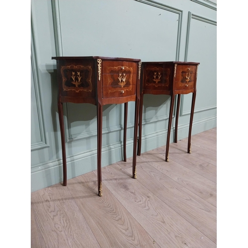 97 - Pair of French kingwood and walnut bedside lockers with ormolu mounts. {70 cm H x 48 cm W x 24 cm D}... 