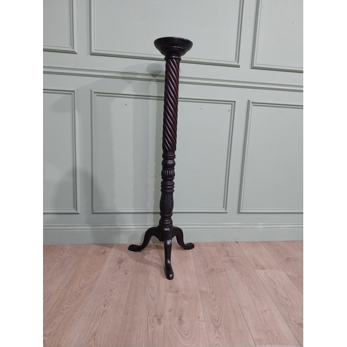 99 - Mahogany torchiere in the Victorian style. {135 cm H x 50 cm Dia.}.