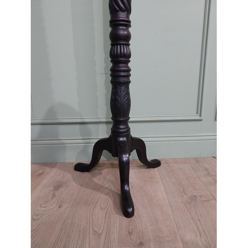 99 - Mahogany torchiere in the Victorian style. {135 cm H x 50 cm Dia.}.