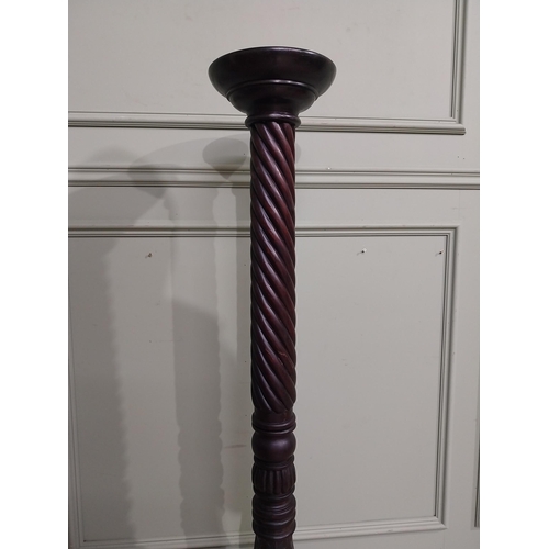 99 - Mahogany torchiere in the Victorian style. {135 cm H x 50 cm Dia.}.