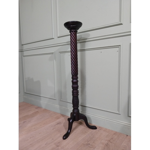 99 - Mahogany torchiere in the Victorian style. {135 cm H x 50 cm Dia.}.