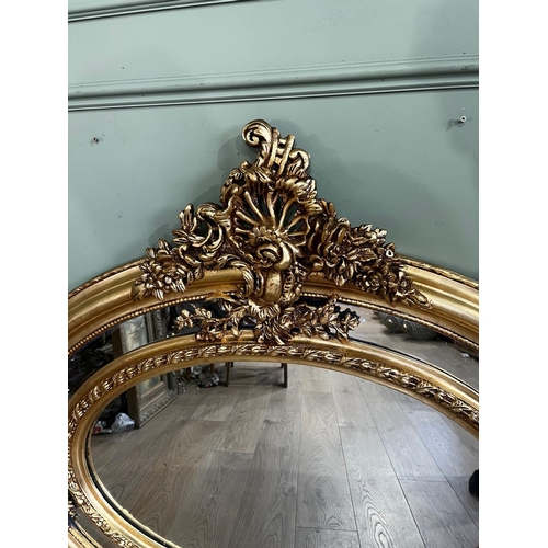 800 - Decorative French gilt oval wall mirror in the Victorian style