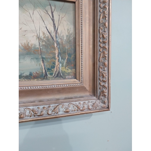 290a - Woodland Scene Oil on Canvas mounted in a gilt frame. { 52cm H X 61cm W }.