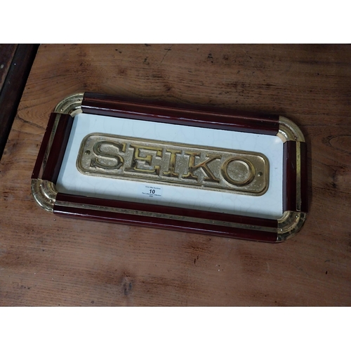 10 - Seiko advertising tray. {20 cm H x 41 cm W}.