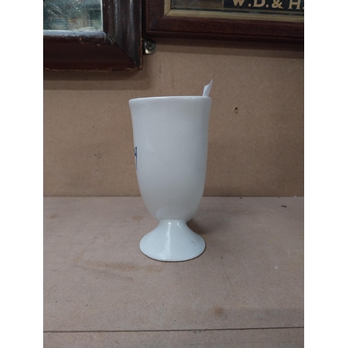 121 - Tuborg ceramic advertising drinking horn. {14 cm H x 17 cm W x 7 cm D}.